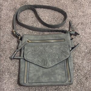 Elegant Gray Crossbody Bag with Detailing